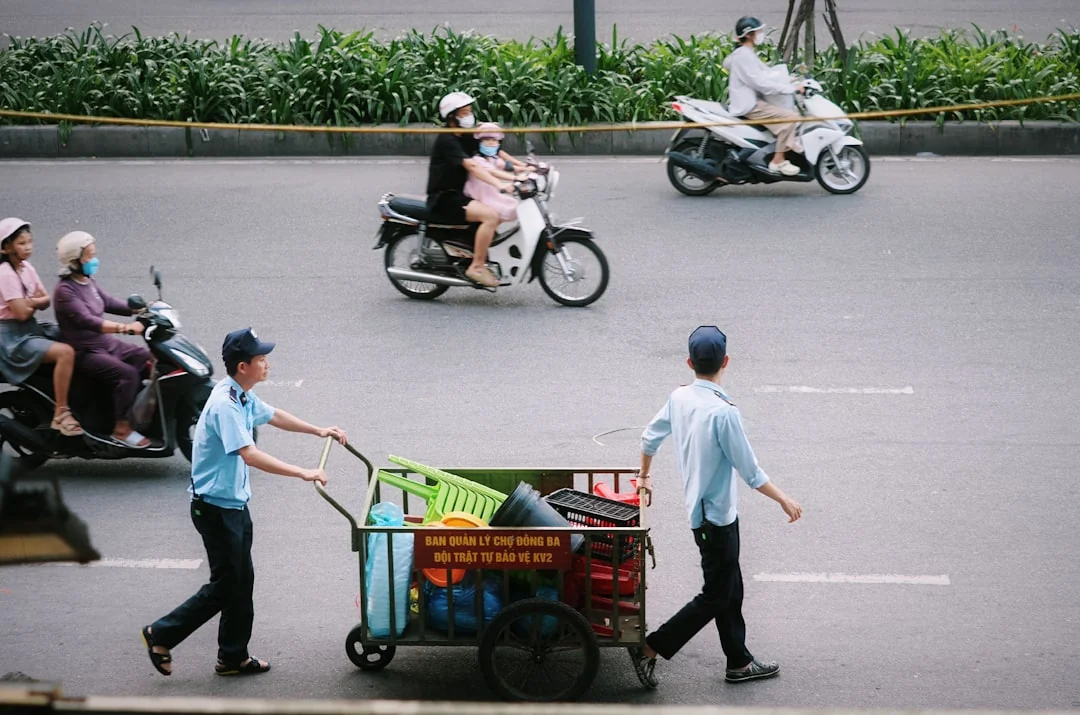 A person sanitizes a work area by fumigation while wearing complete protective equipment for protection.